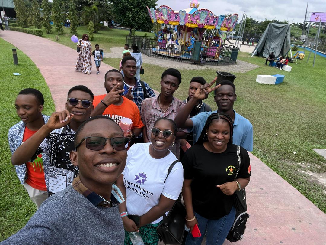 Group selfie with scholars and staff during a park day