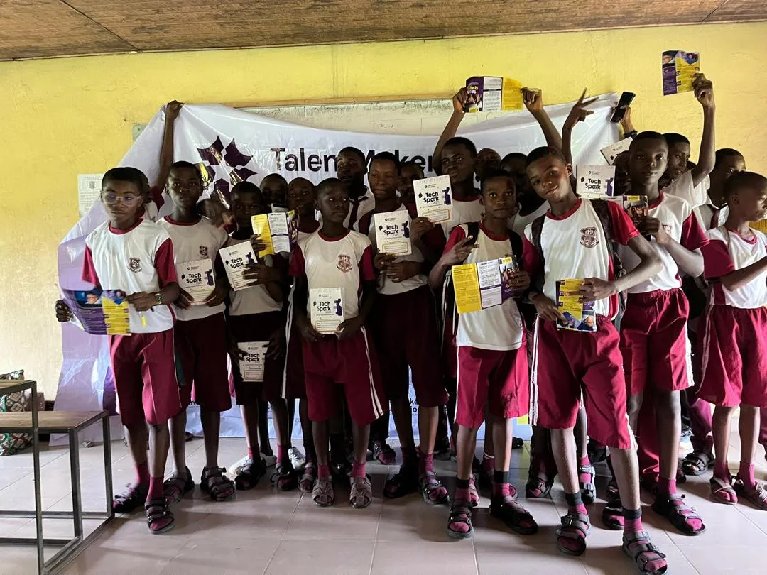 Students at EHS Borokiri cheering with TechSpark materials in hand