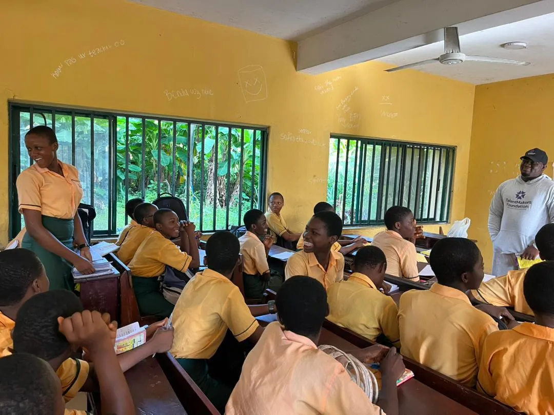 TalentMakers Foundation staff working with students in a classroom