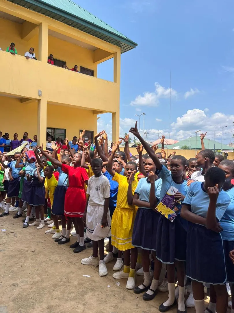 Students from several schools lined up outdoors before a TechSpark session