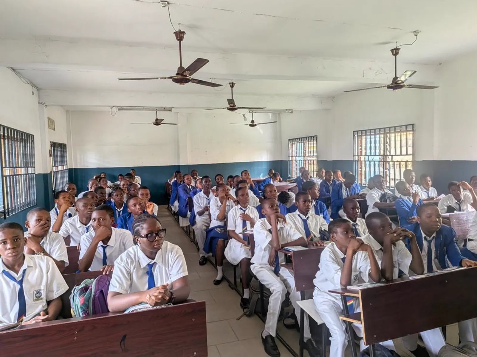 A full classroom of students listening attentively during a TechSpark school visit